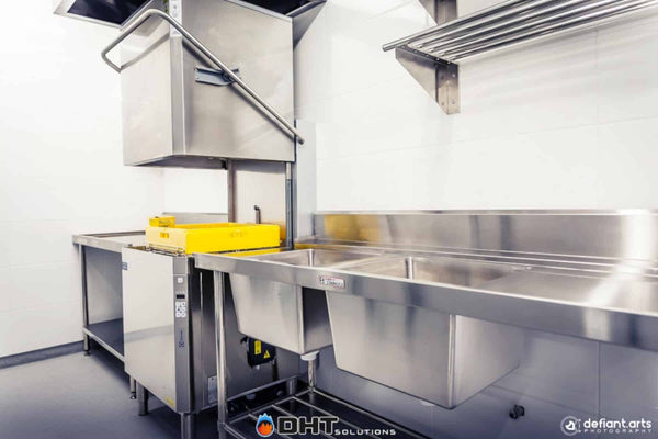 Butcher's Daughter Seville - Electrolux NHT8G hood type dishwasher with Simply Stainless inlet-out bench