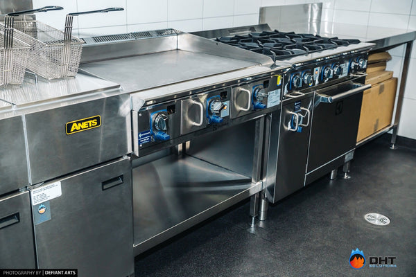 Anets fryer beside the Electrolux griddle, gas burners and oven range