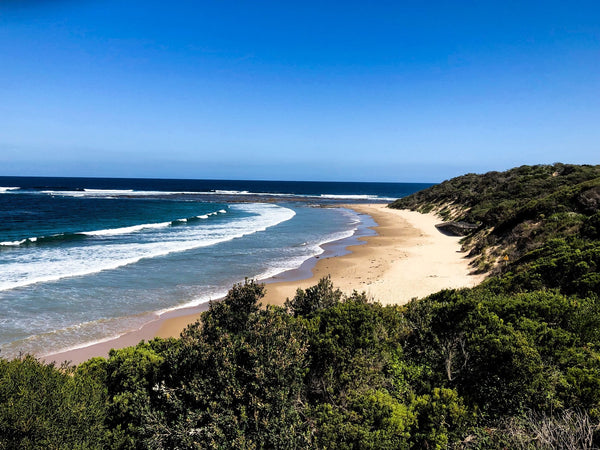 The beach and clifftops below Cape Paterson Surf Life Saving Club