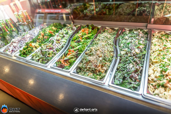 Refrigerated salad display filled with prepared salads